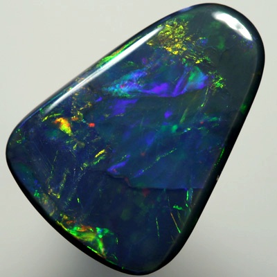 SOLID BLACK OPAL  Bright and very strong gem fire SEE VIDEO